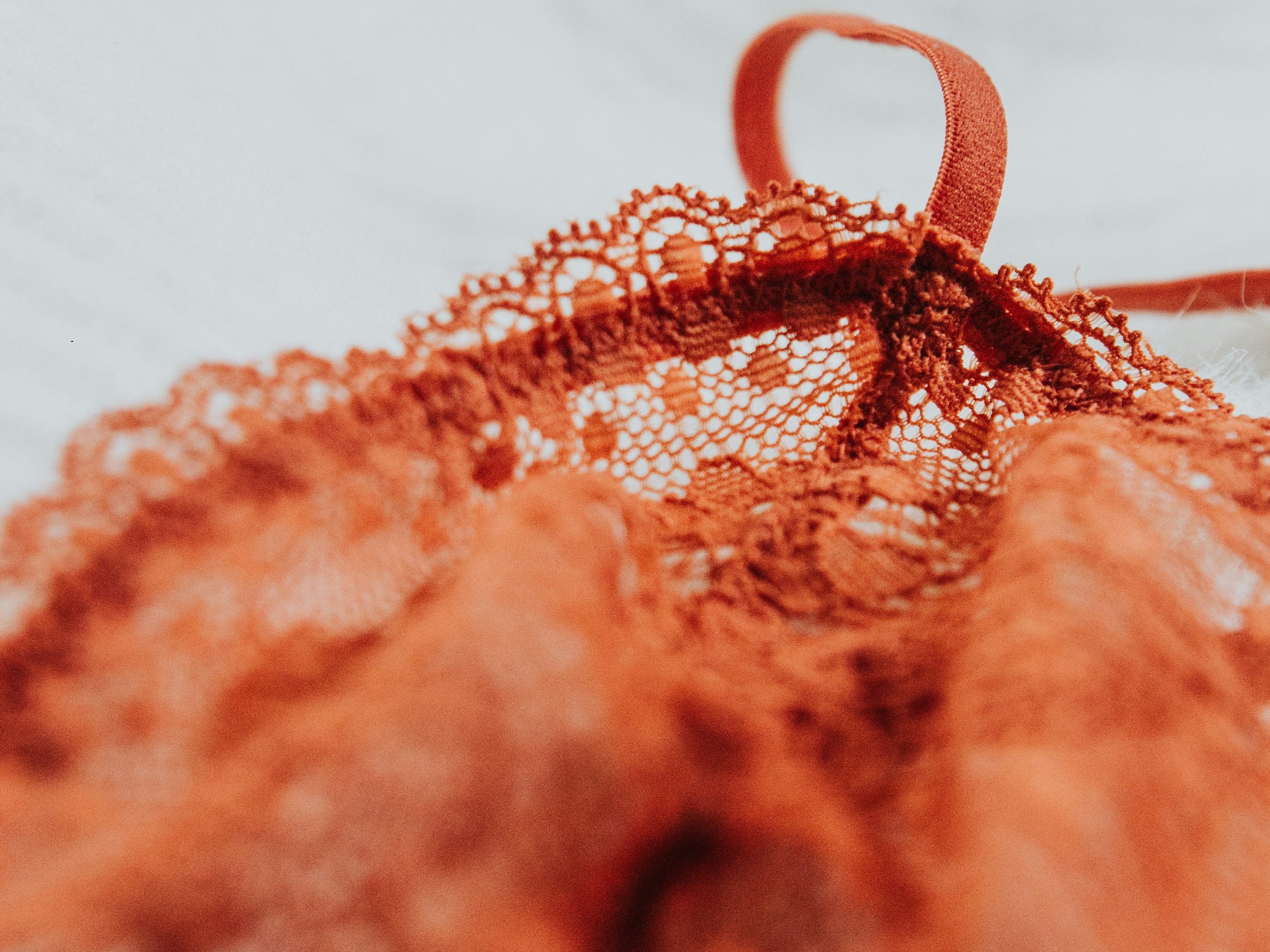 A red bra on a tabletop